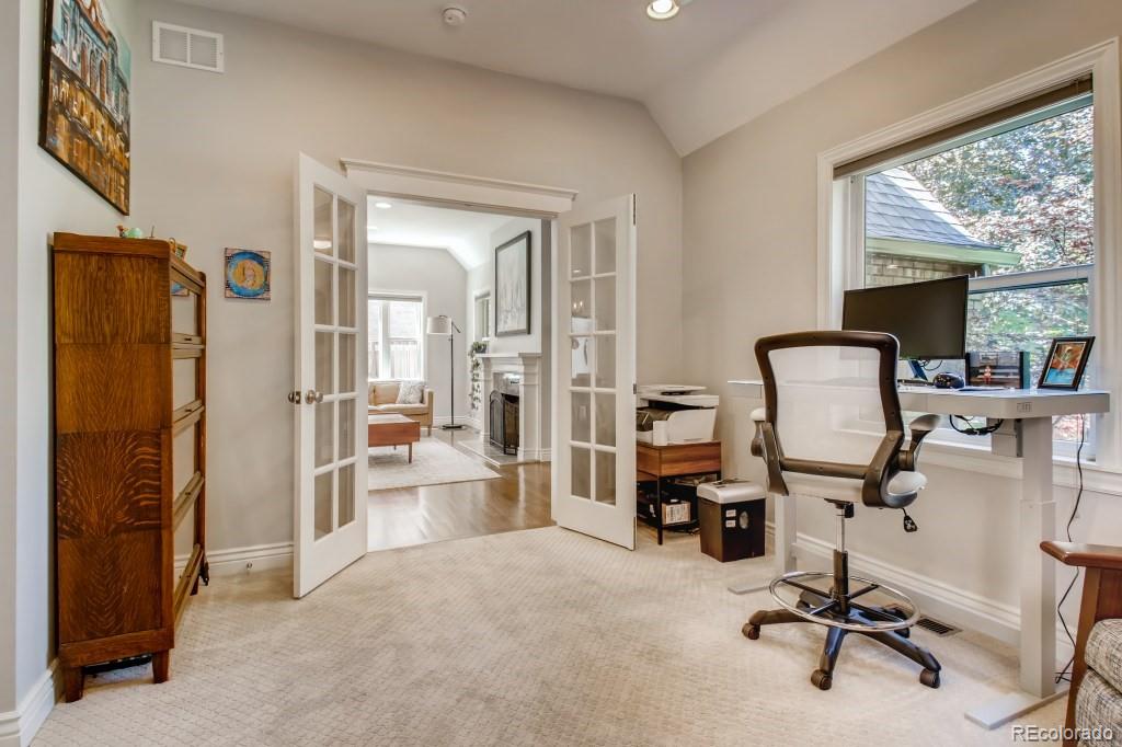 3234 Stuart Street Denver, CO 80212 - Photo 13 of 40 a view of a workspace with furniture and a window