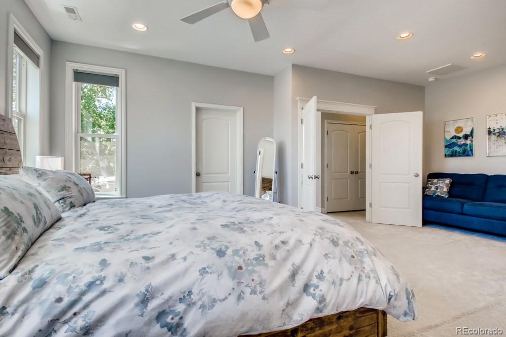 3234 Stuart Street Denver, CO 80212 - Photo 20 of 40 a bedroom with a bed and a dresser