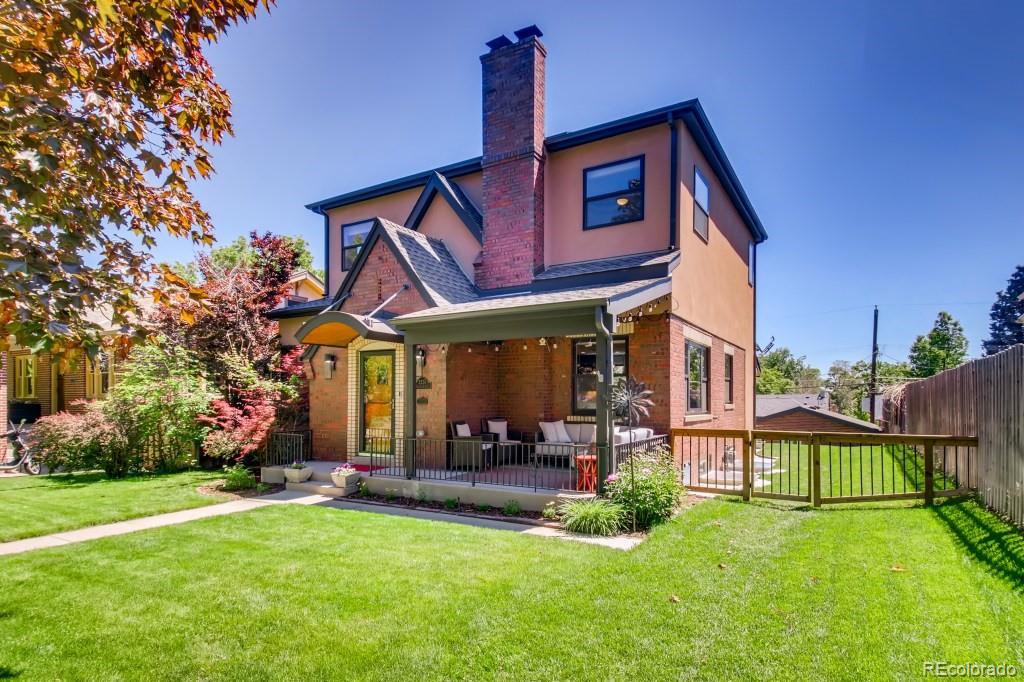 3234 Stuart Street Denver, CO 80212 - Photo 2 of 40 front view of a house with a yard