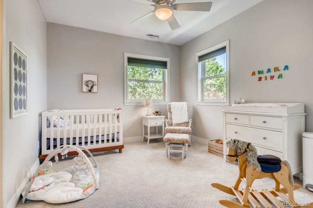 3234 Stuart Street Denver, CO 80212 - Photo 26 of 40 a bedroom with furniture and a window
