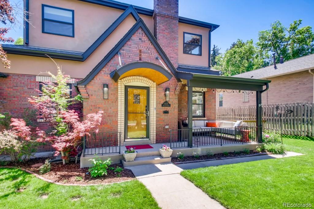 3234 Stuart Street Denver, CO 80212 - Photo 3 of 40 a front view of house with a garden and patio