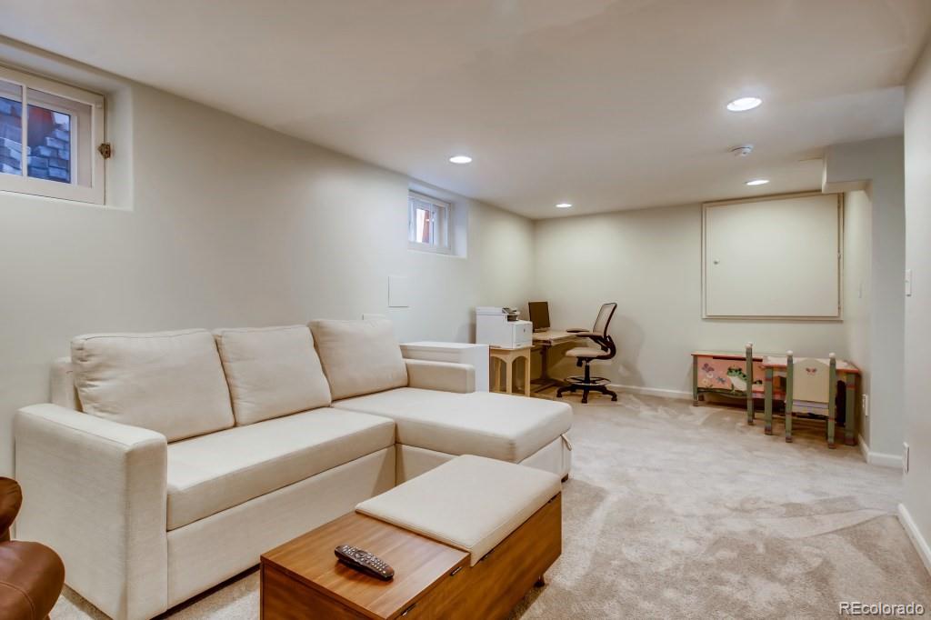 3234 Stuart Street Denver, CO 80212 - Photo 31 of 40 a living room with furniture