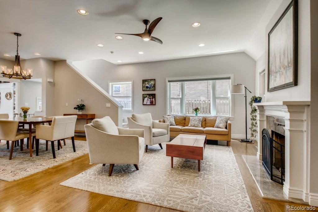 3234 Stuart Street Denver, CO 80212 - Photo 5 of 40 a living room with fireplace furniture and a rug