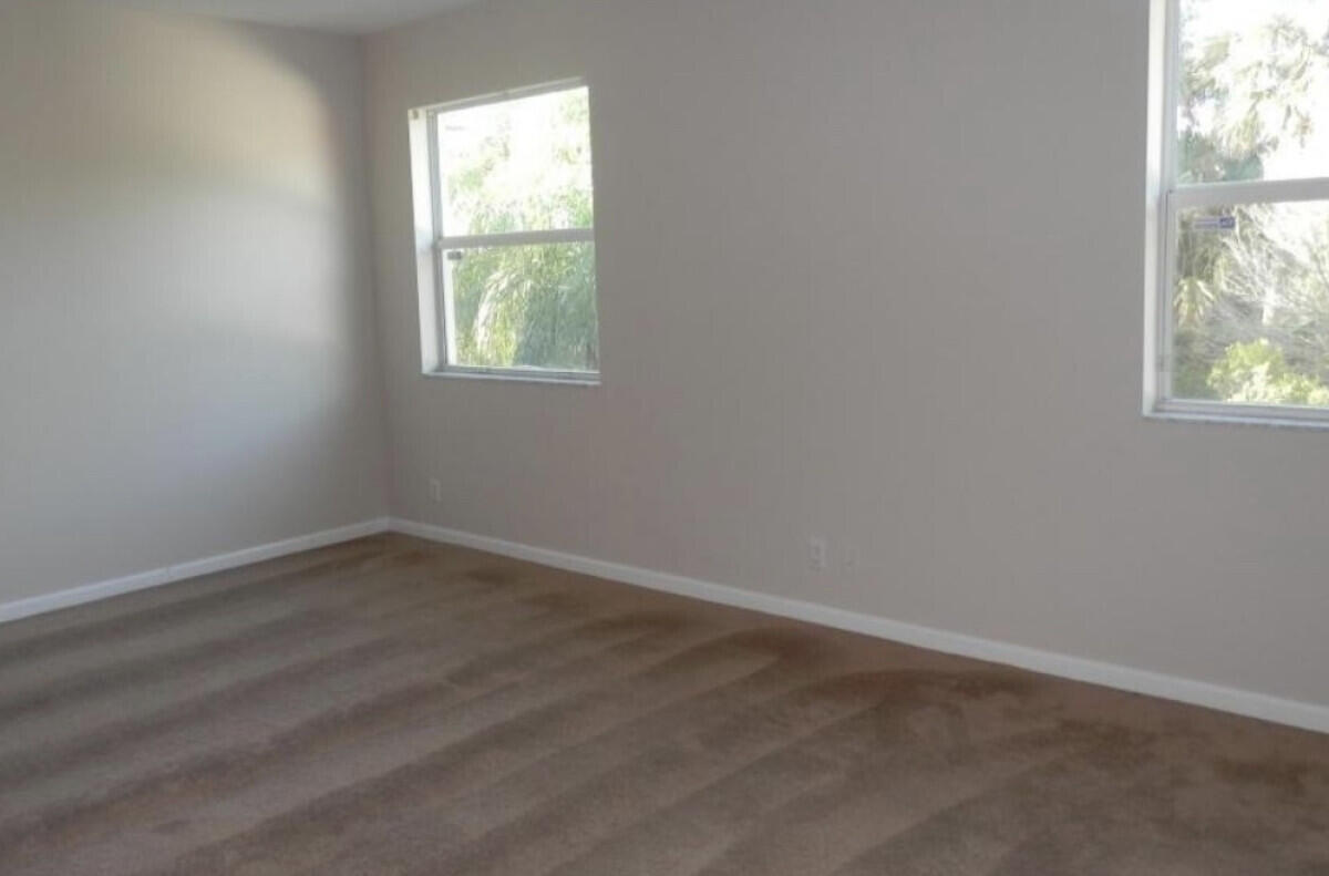 8726 Tally Ho Lane West Palm Beach, FL 33411 - Photo 17 of 33 an empty room with a window