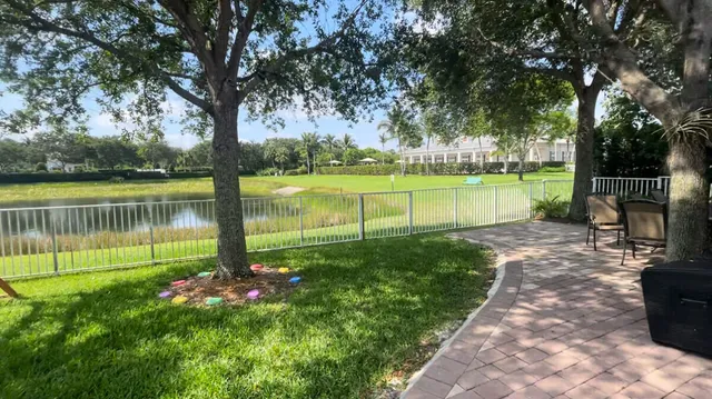 a view of a garden with lake view