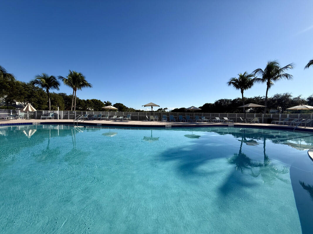 8726 Tally Ho Lane West Palm Beach, FL 33411 - Photo 24 of 33 a view of a lake with houses