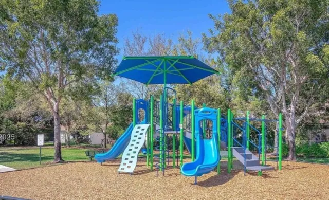 a view of a park with slide
