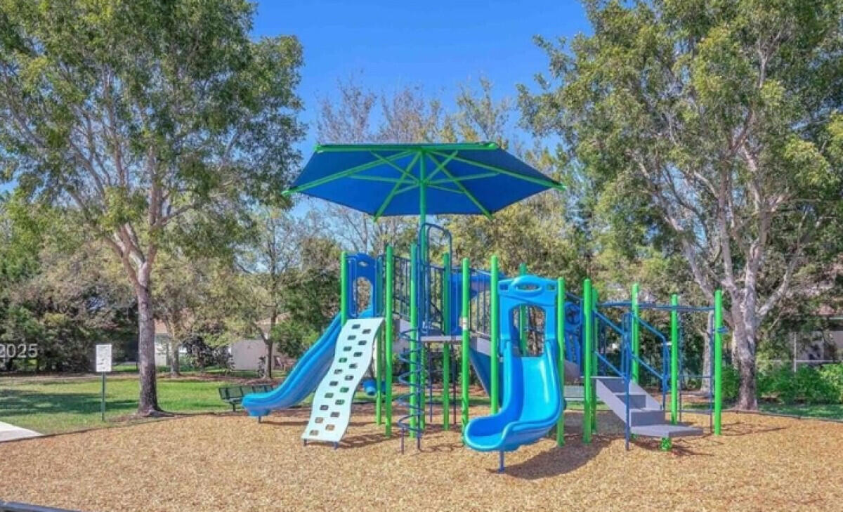 8726 Tally Ho Lane West Palm Beach, FL 33411 - Photo 26 of 33 a view of a park with slide