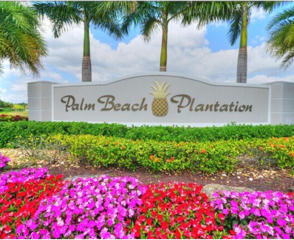 8726 Tally Ho Lane West Palm Beach, FL 33411 - Photo 33 of 33 a sign on the side of the road