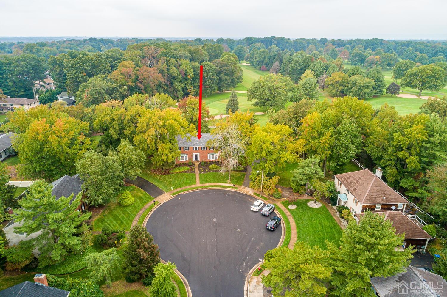 8 Bluebird Court Edison, NJ 08820 - Photo 1 of 15 an aerial view of a house with a yard and lake view