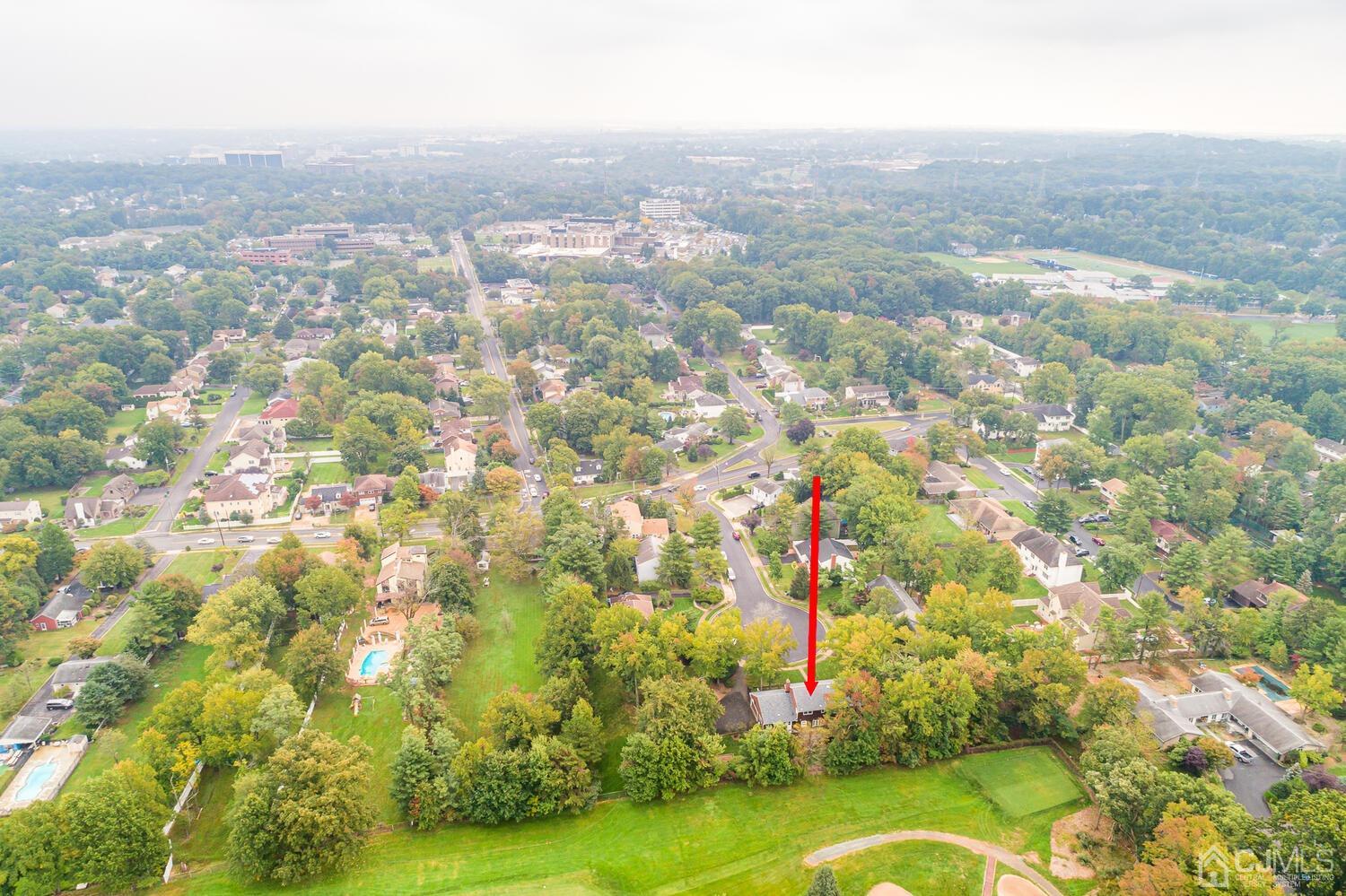 8 Bluebird Court Edison, NJ 08820 - Photo 7 of 15 an aerial view of residential houses with outdoor space and trees
