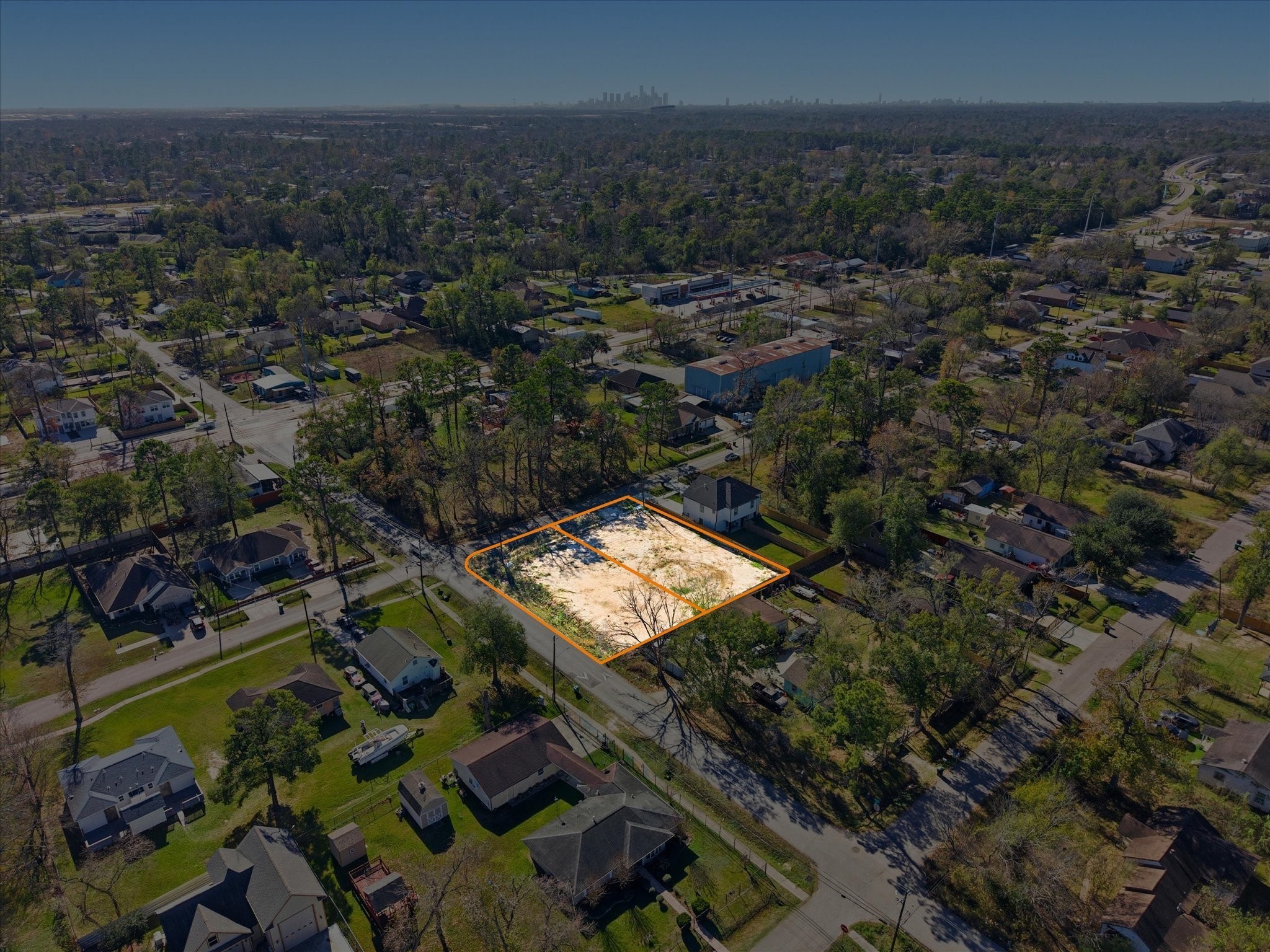 8227 Hamlet Street Houston, TX 77078 - Photo 2 of 17 an aerial view of residential houses with outdoor space