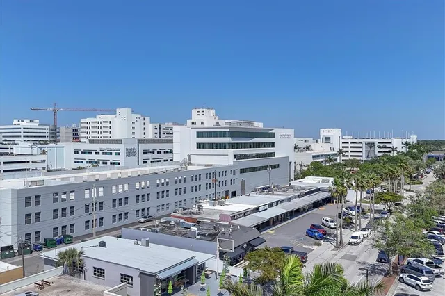 a view of a city with tall buildings