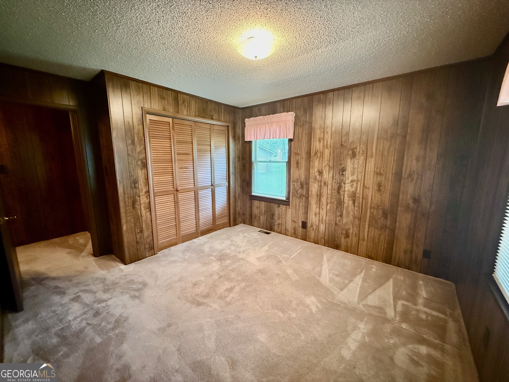 5741 Lawrence Court Macon, GA 31216 - Photo 11 of 22 a view of an empty room and window