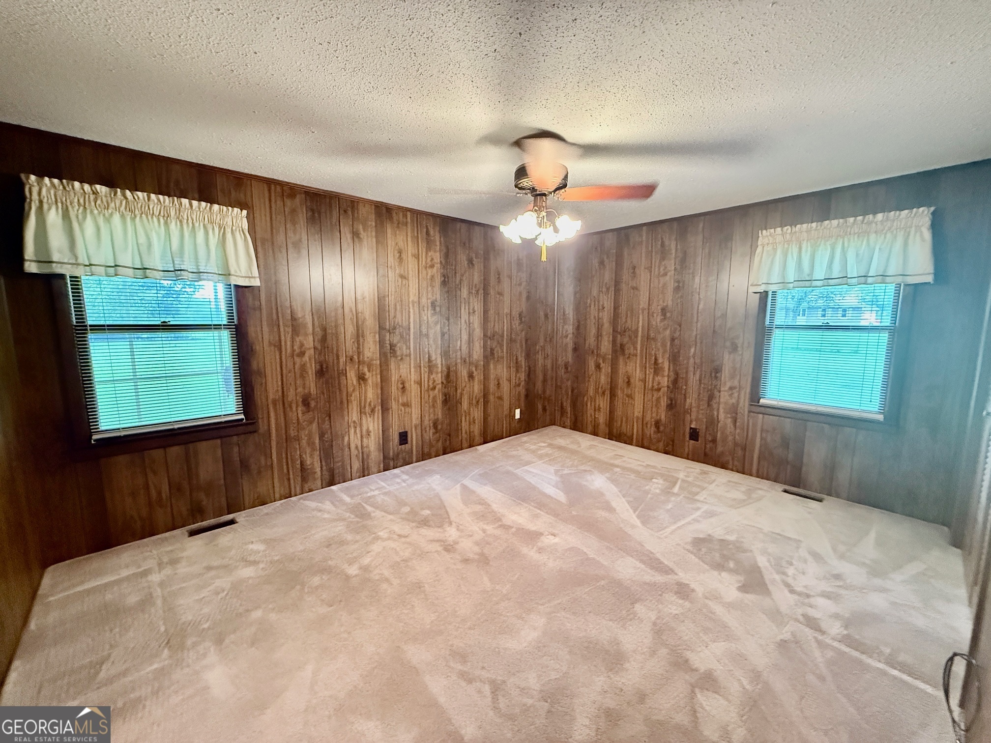 5741 Lawrence Court Macon, GA 31216 - Photo 12 of 22 a big room with windows and closet