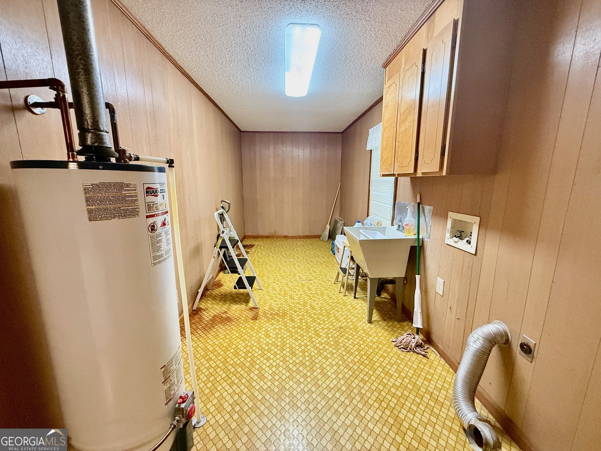 5741 Lawrence Court Macon, GA 31216 - Photo 15 of 22 a view of a livingroom with furniture and a window