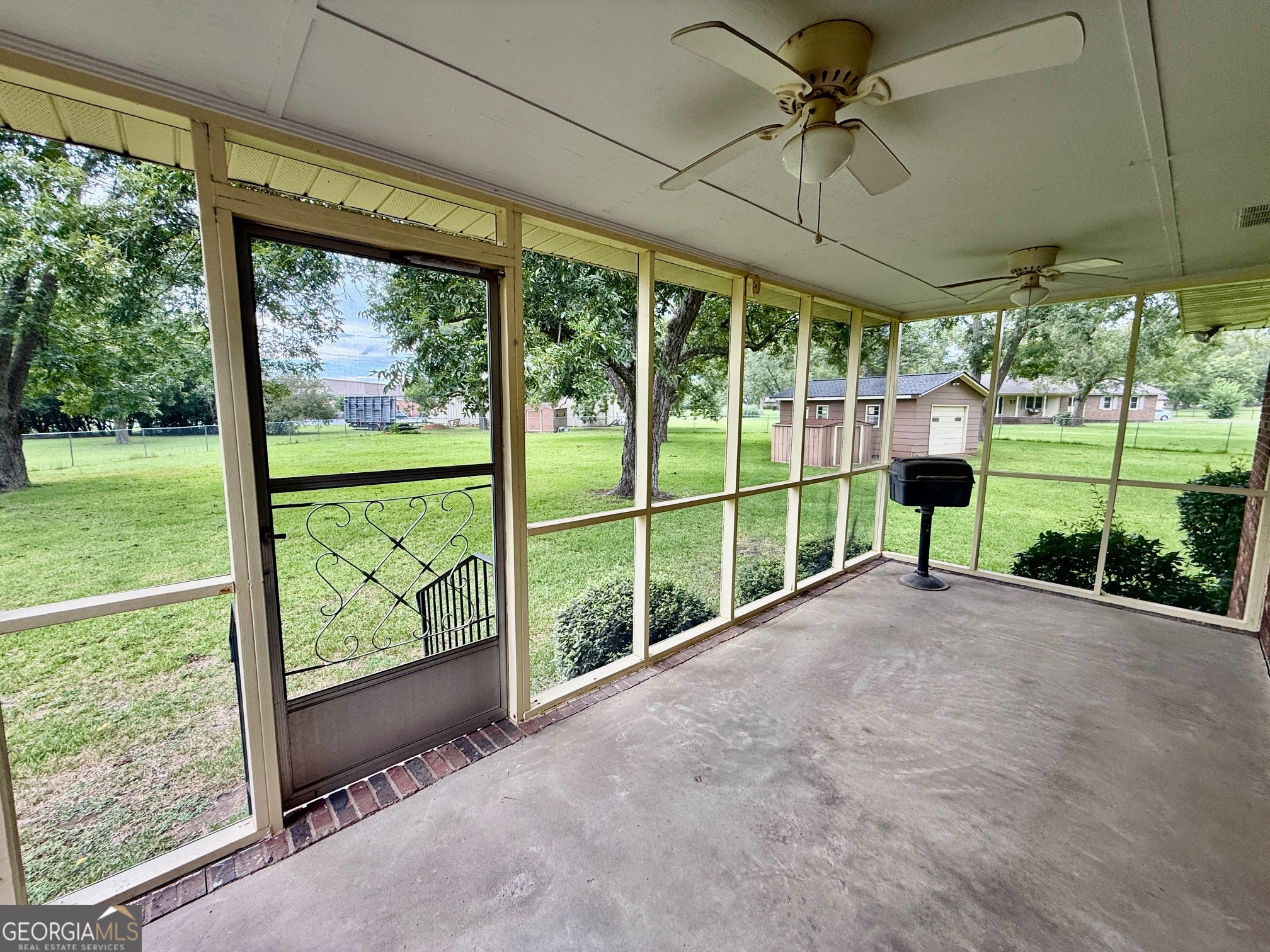 5741 Lawrence Court Macon, GA 31216 - Photo 17 of 22 a view of a room with a big yard