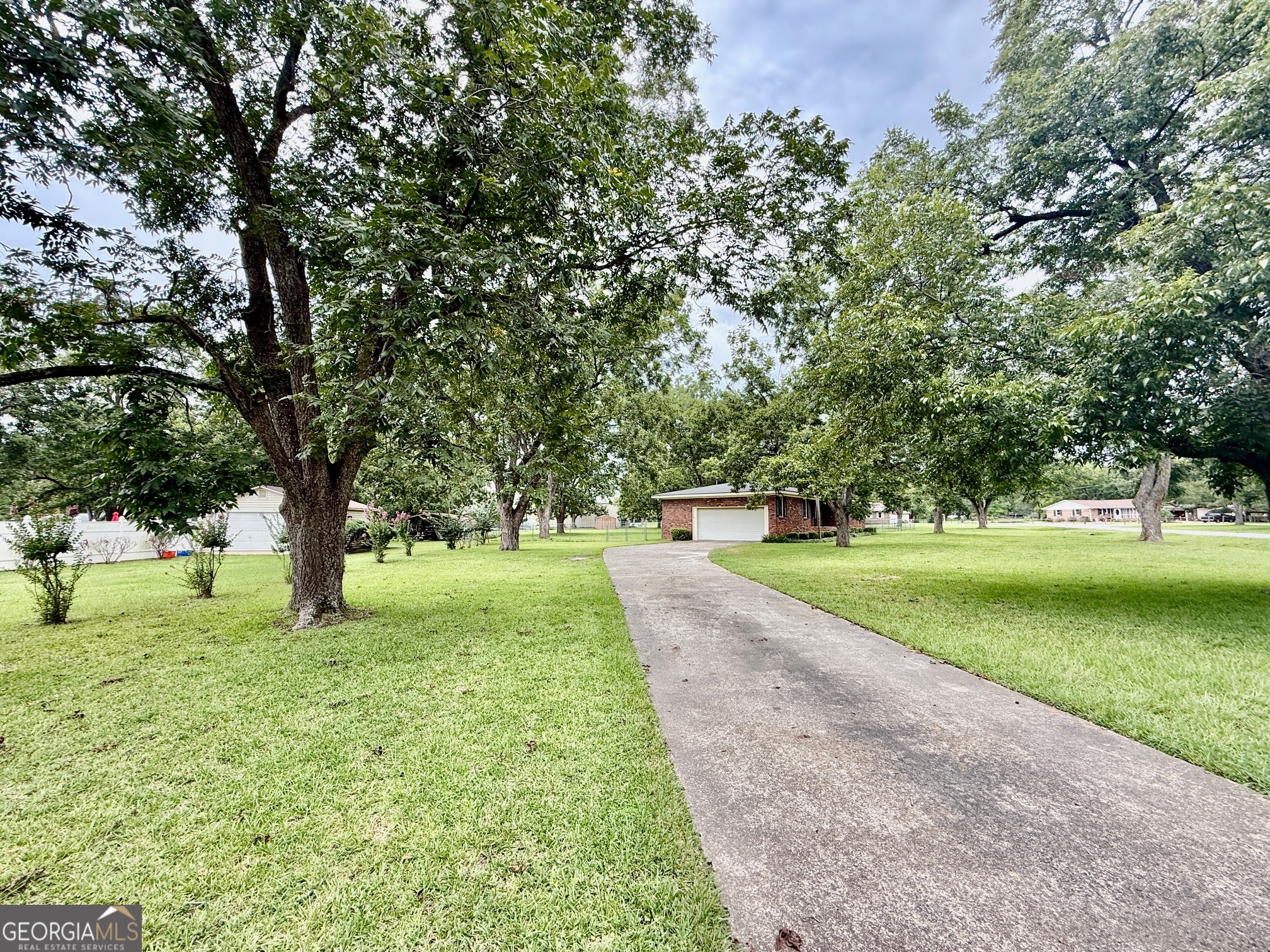 5741 Lawrence Court Macon, GA 31216 - Photo 22 of 22 a huge green field with lots of trees