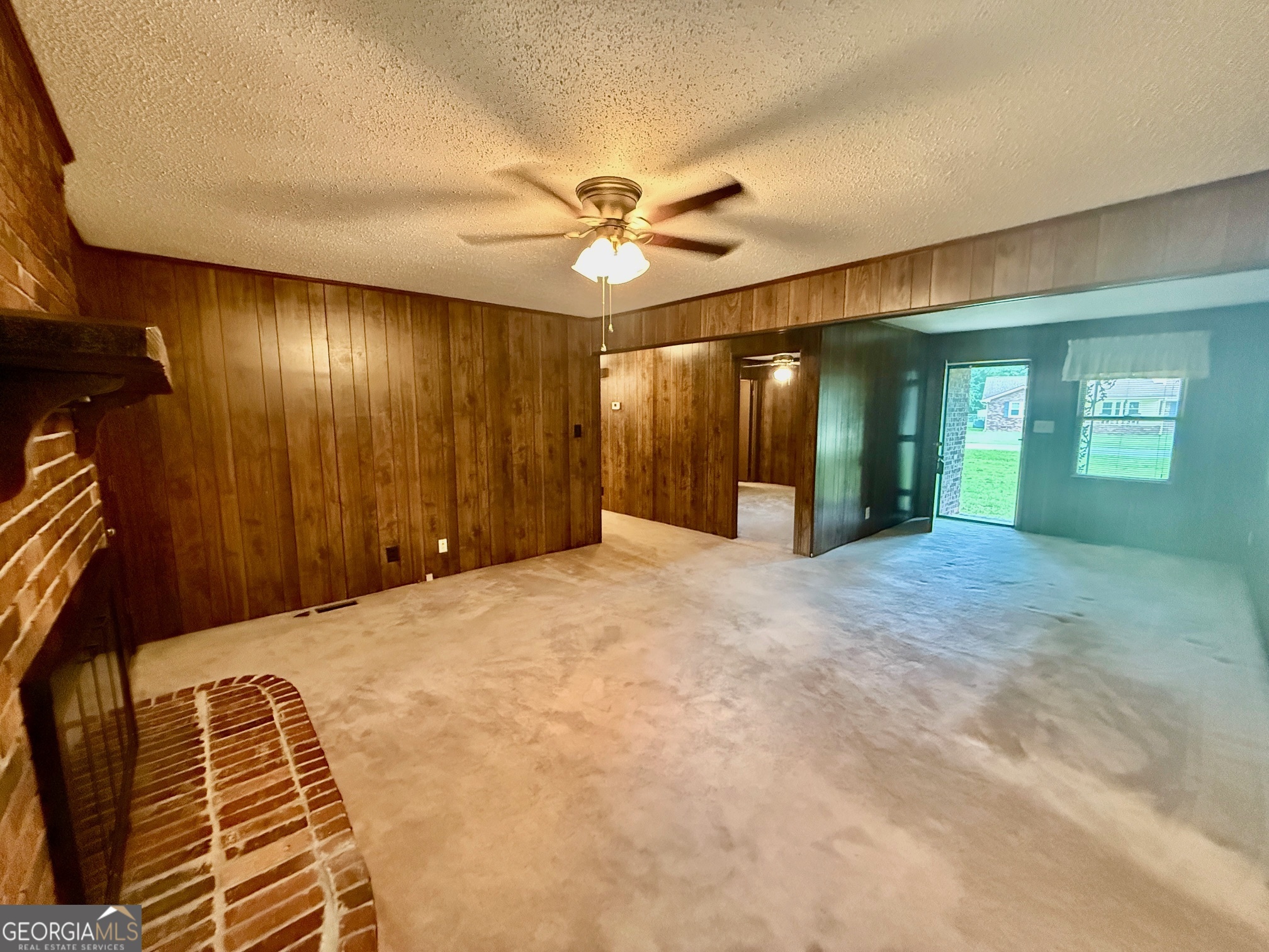5741 Lawrence Court Macon, GA 31216 - Photo 4 of 22 a view of livingroom with workspace