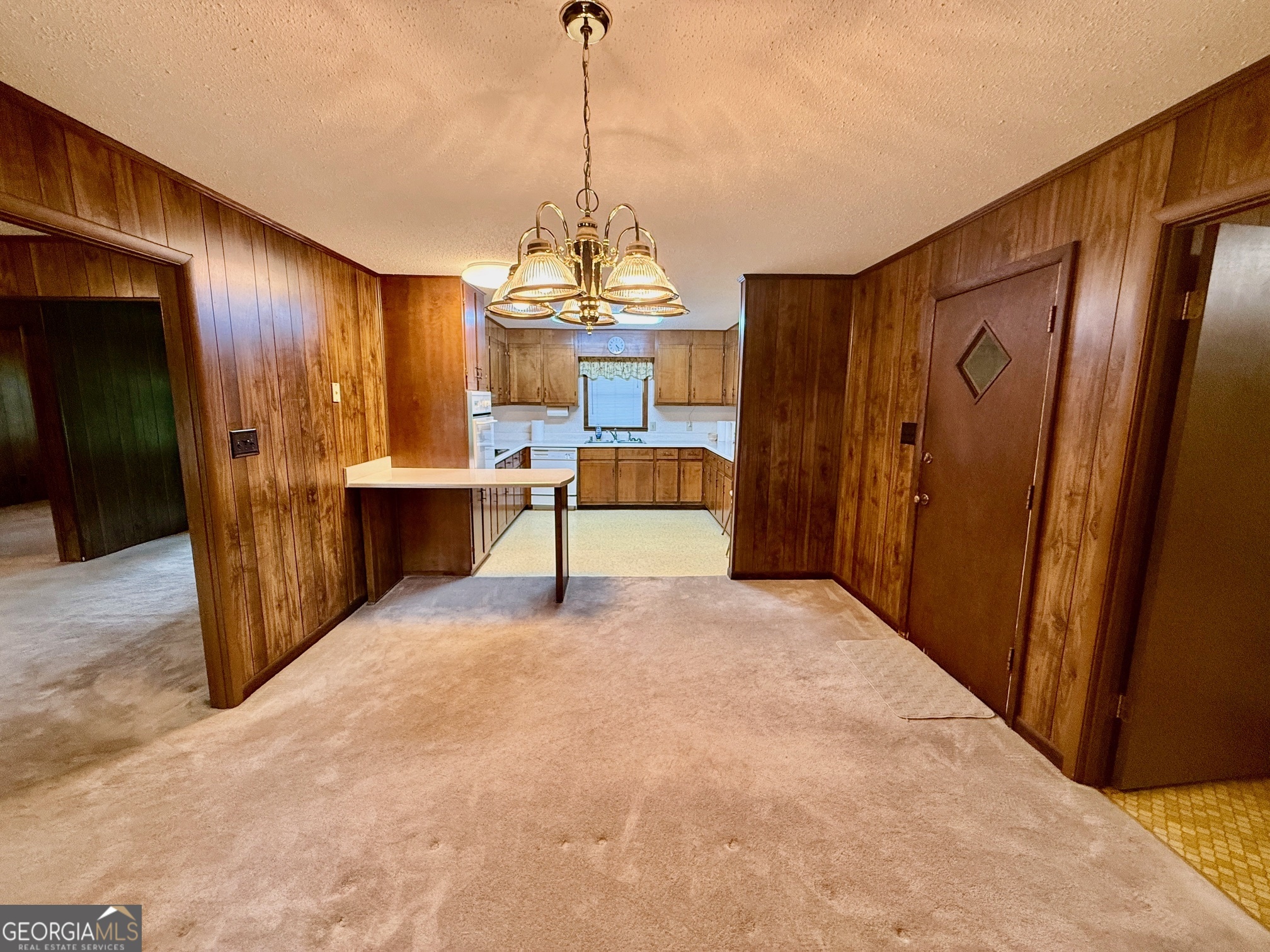 5741 Lawrence Court Macon, GA 31216 - Photo 5 of 22 a view of a livingroom with furniture window and wooden floor