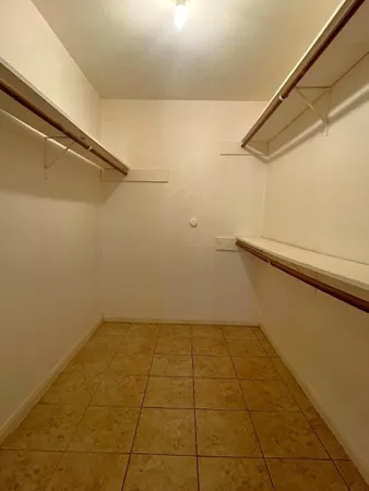 a view of a room with white walls
