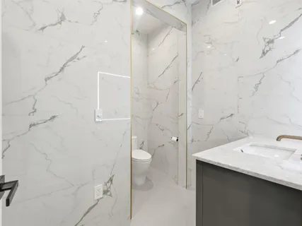 a bathroom with a sink and mirror