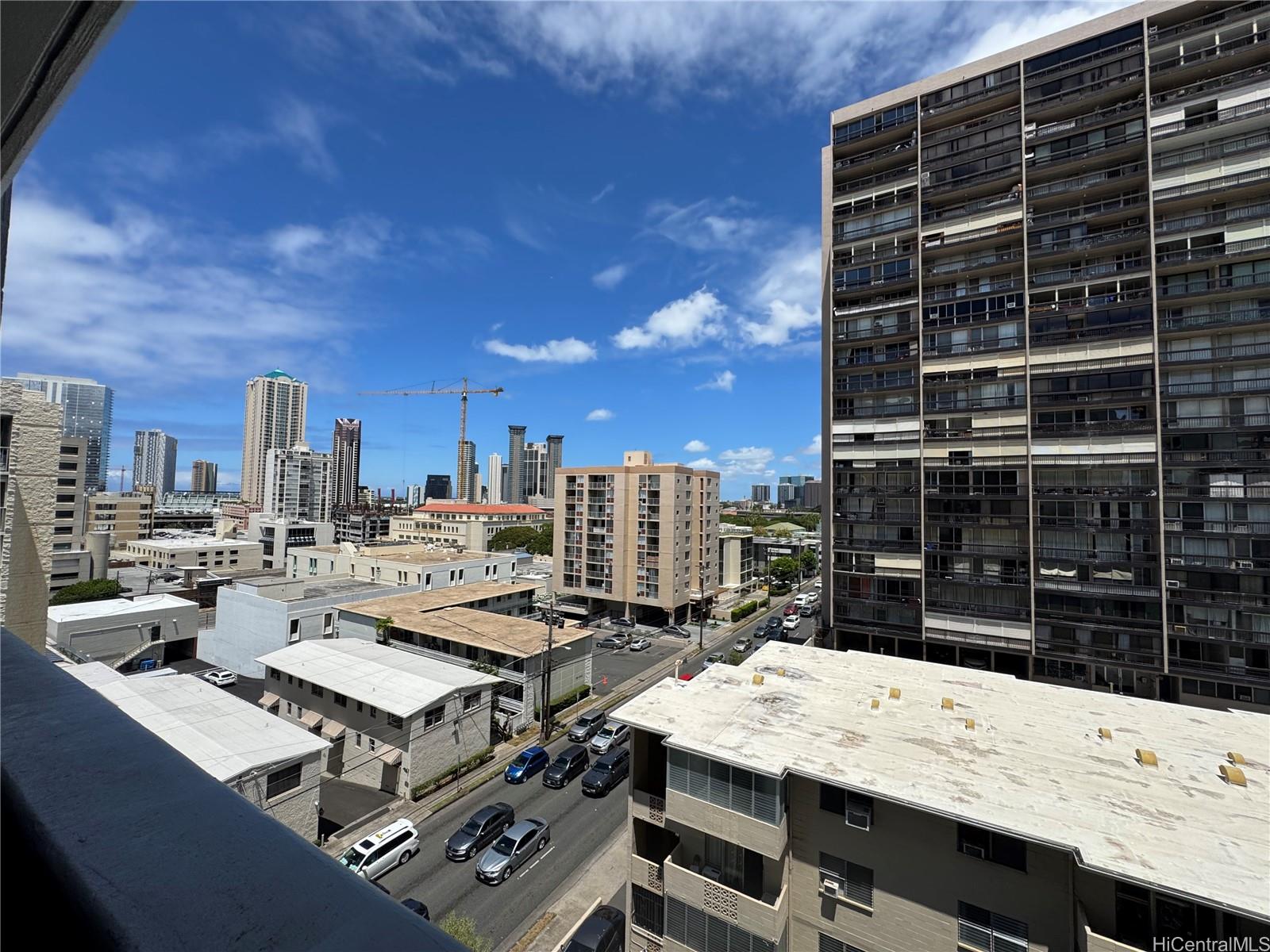 a view of a roof deck with a barbeque