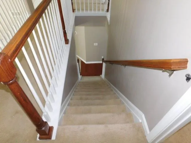a view of a hallway with windows
