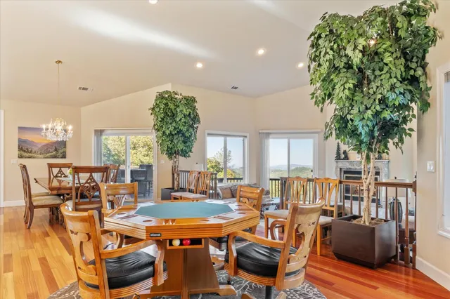 a bathroom with a granite countertop sink and a toilet