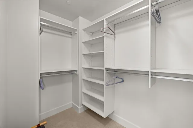 a view of an empty walk in closet