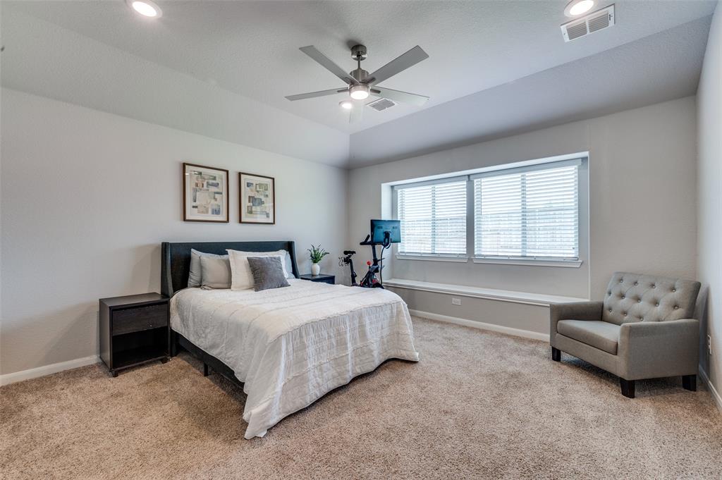 1305 Coyote Ridge Aubrey, TX 76227 - Photo 18 of 34 Primary bedroom
