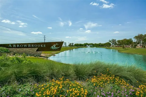a view of a lake from a yard