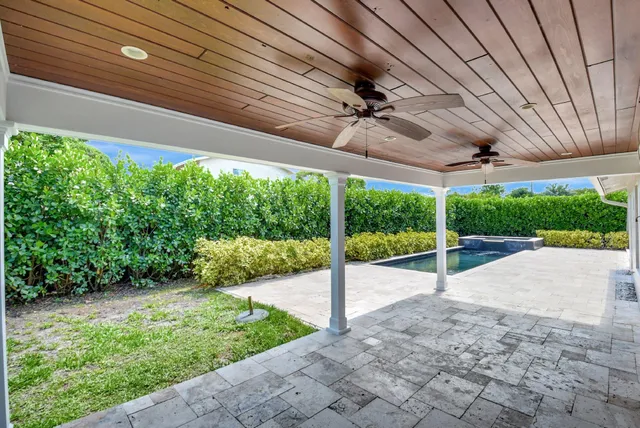 an aerial view of house with yard
