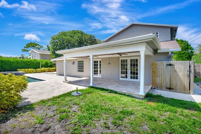 a view of swimming pool with a patio