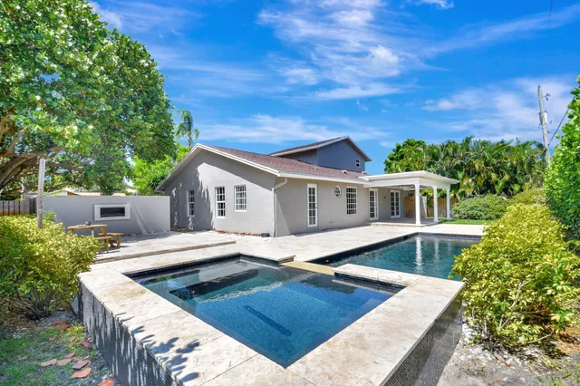a utility room with refrigerator washer and dryer