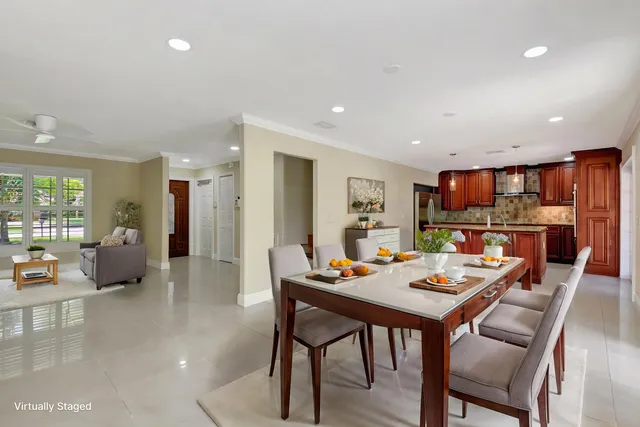 a outdoor space with a table and chairs