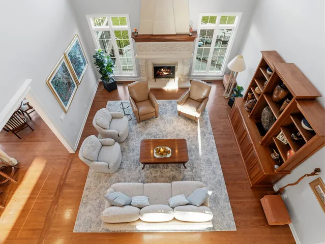 a bedroom with a large bed and a rug