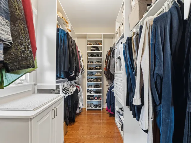 a view of an entryway with wooden floor