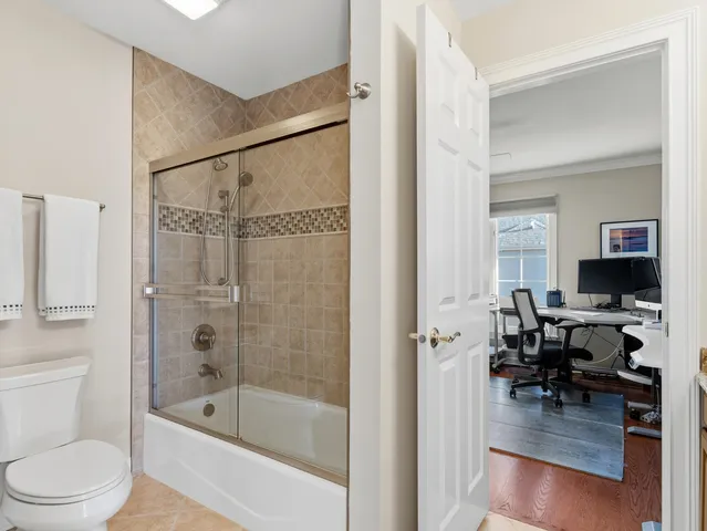 a view of a golf course with the lake