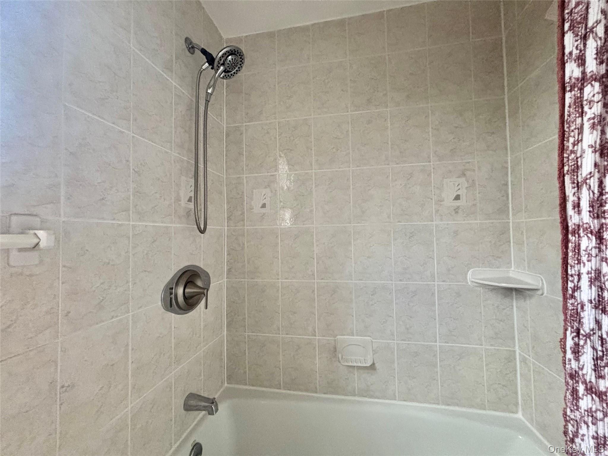 72-29 Little Neck Parkway, Unit 2 Queens, NY 11426 - Photo 21 of 24 a bathroom with a shower