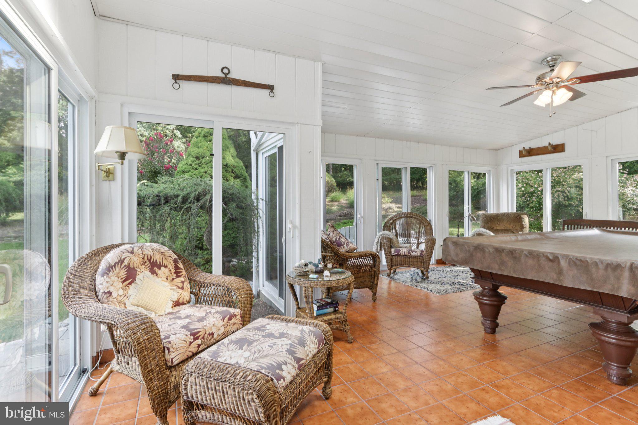 294 Batleson Road Ambler, PA 19002 - Photo 20 of 50 a living room with furniture and a large window