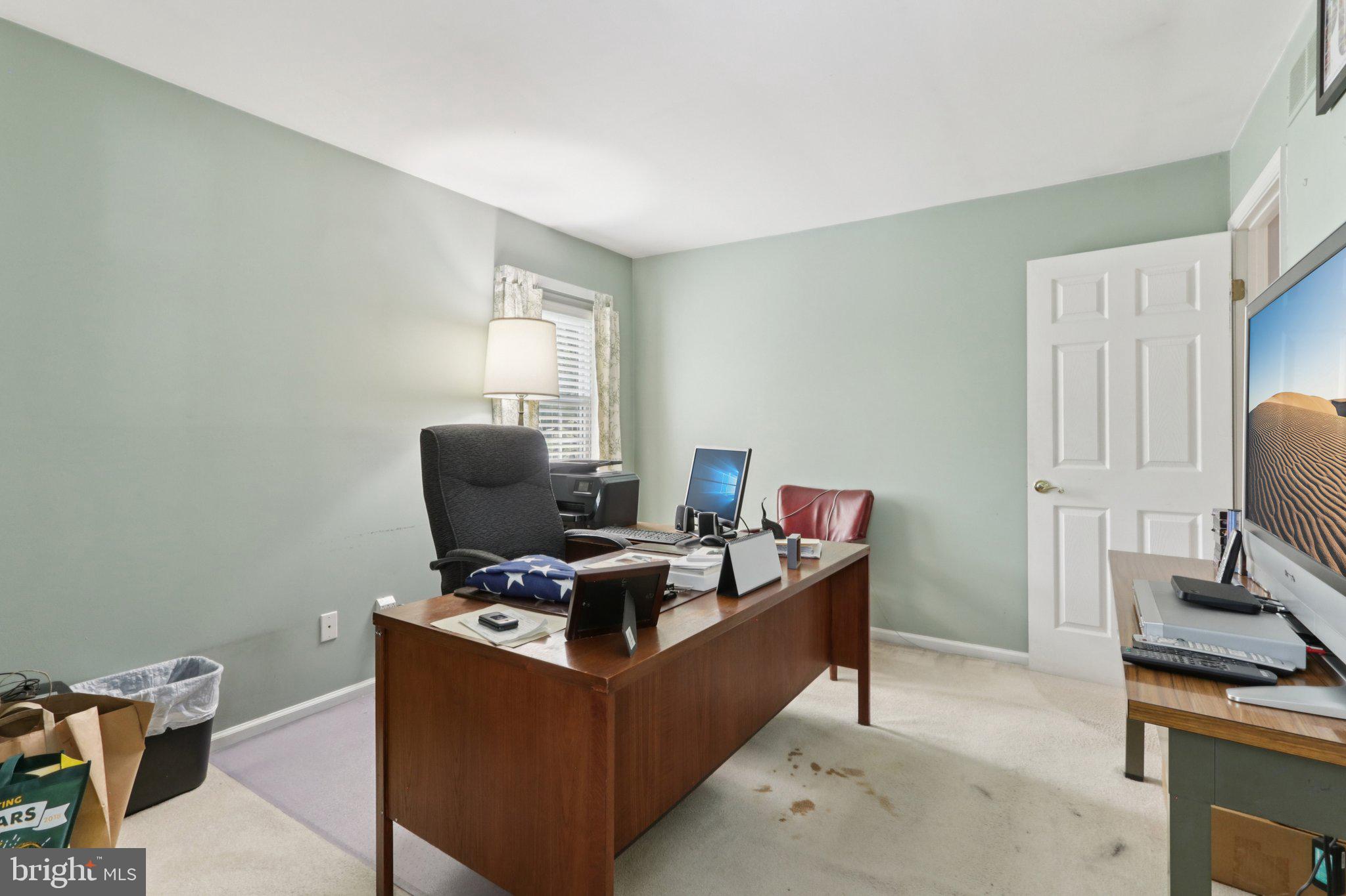 294 Batleson Road Ambler, PA 19002 - Photo 36 of 50 a living room with furniture and a window