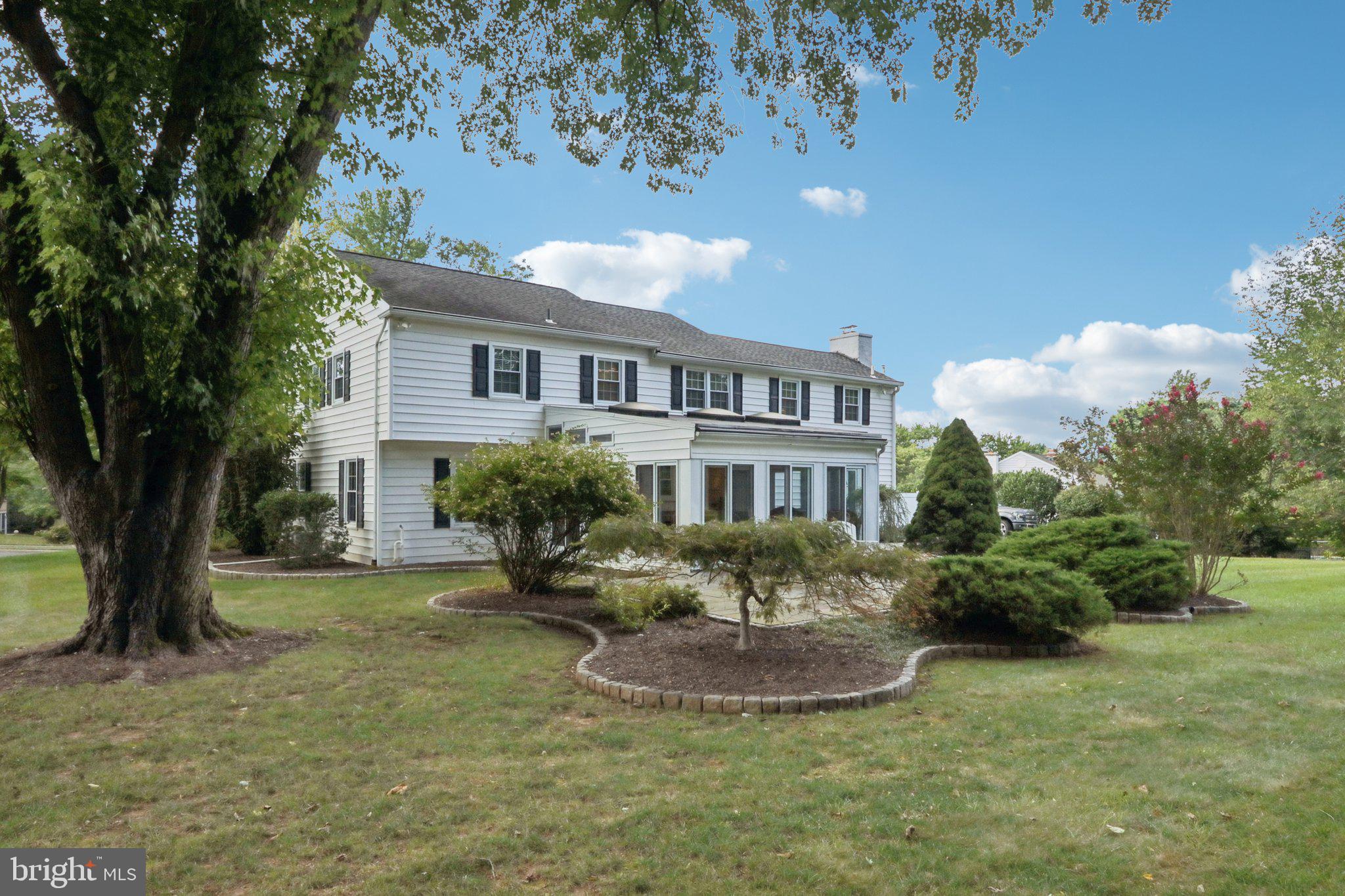 294 Batleson Road Ambler, PA 19002 - Photo 43 of 50 a front view of a house with a garden
