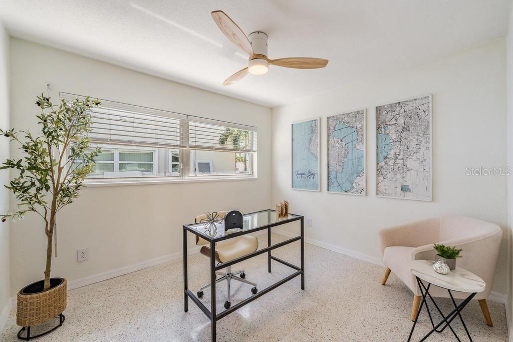 11305 5th Street East Treasure Island, FL 33706 - Photo 17 of 40 a living room with furniture and a window