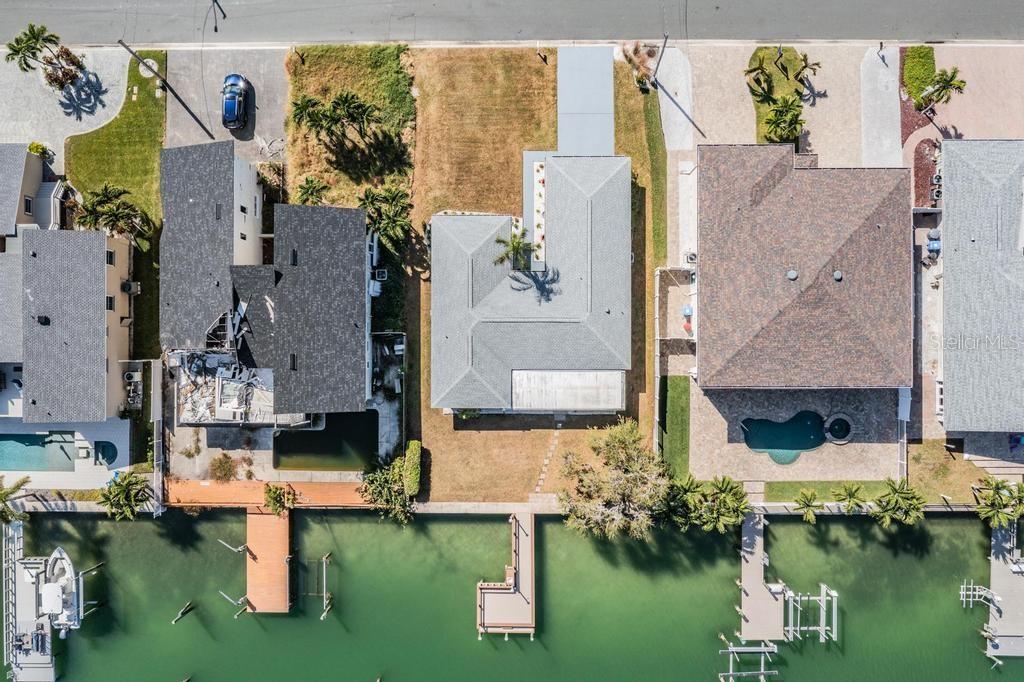 11305 5th Street East Treasure Island, FL 33706 - Photo 25 of 40 an aerial view of a house with a pool yard and outdoor seating