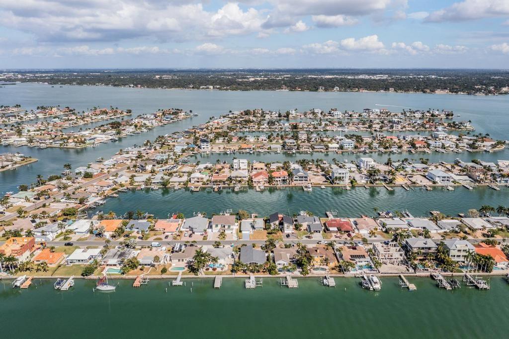 11305 5th Street East Treasure Island, FL 33706 - Photo 28 of 40 a view of a city with lots of residential buildings lake and ocean view