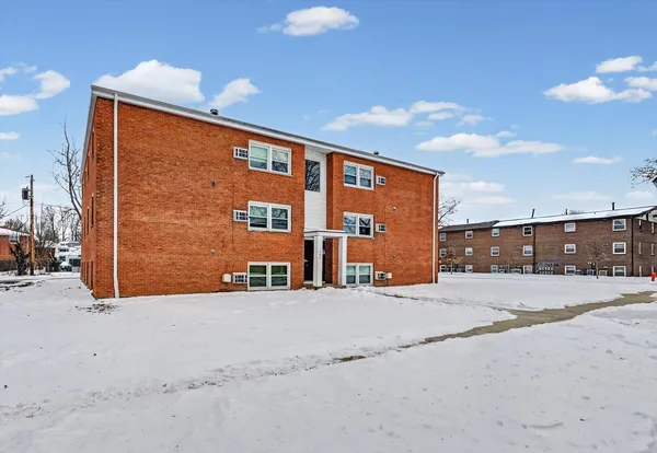 a view of a terrace with a building