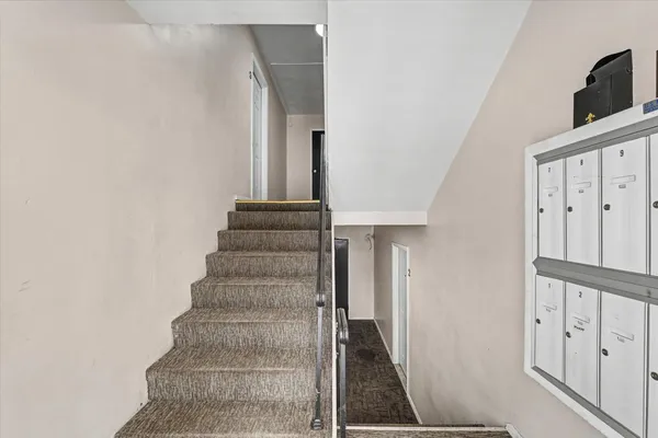 a view of an entryway with staircase