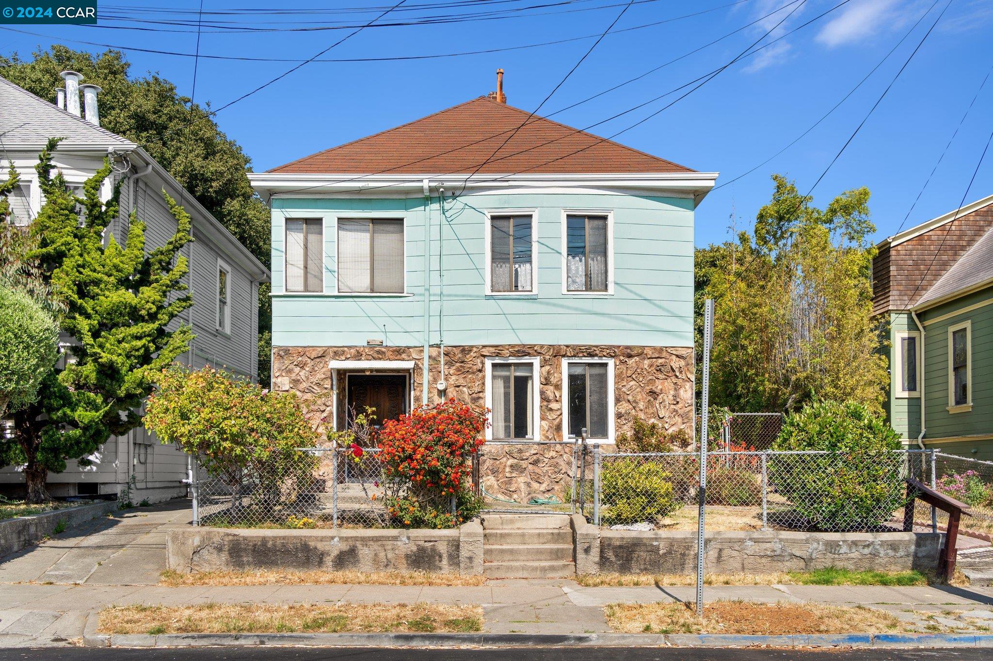 2413 Seventh Street Berkeley, CA 94710 - Photo 1 of 1 a front view of a house with garden