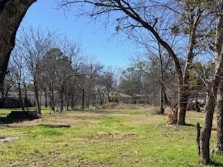 906 Virginia Street Graham, TX 76450 - Photo 2 of 4 a view of outdoor space with trees